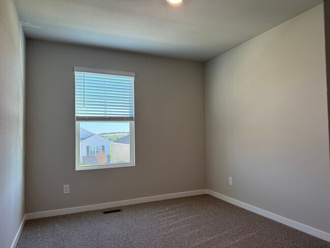 Building Photo - Spacious 4-Bedroom Split-Level Near Standing Bear Lake & Trails