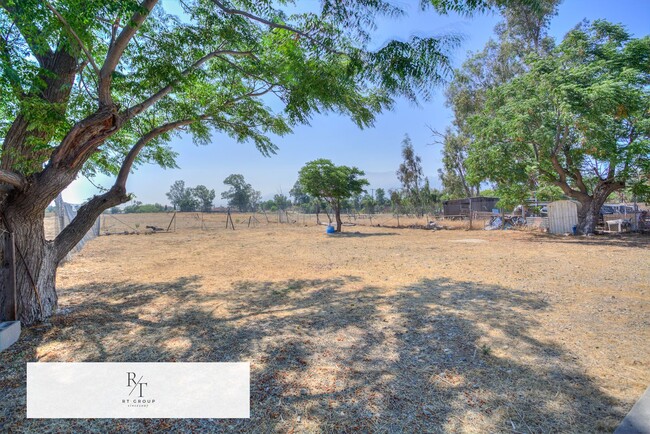 Building Photo - Spacious 4-Bedroom Home on Nearly 1 Acre –...