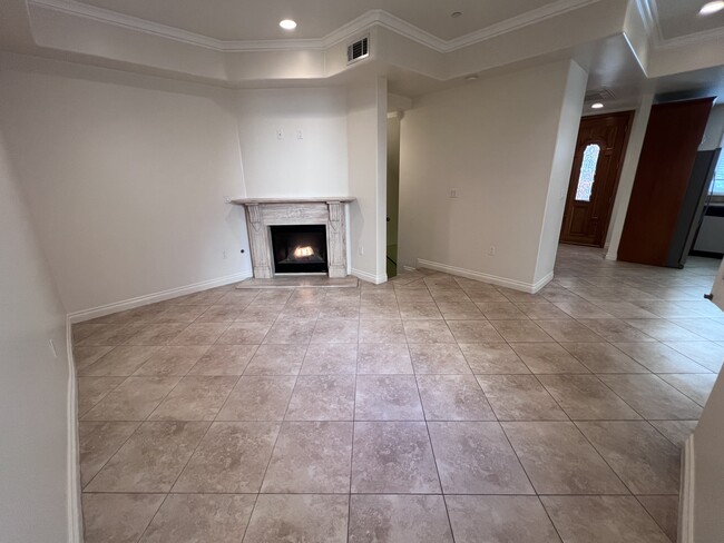 The living area with a fireplace - 430 W Wilson Ave