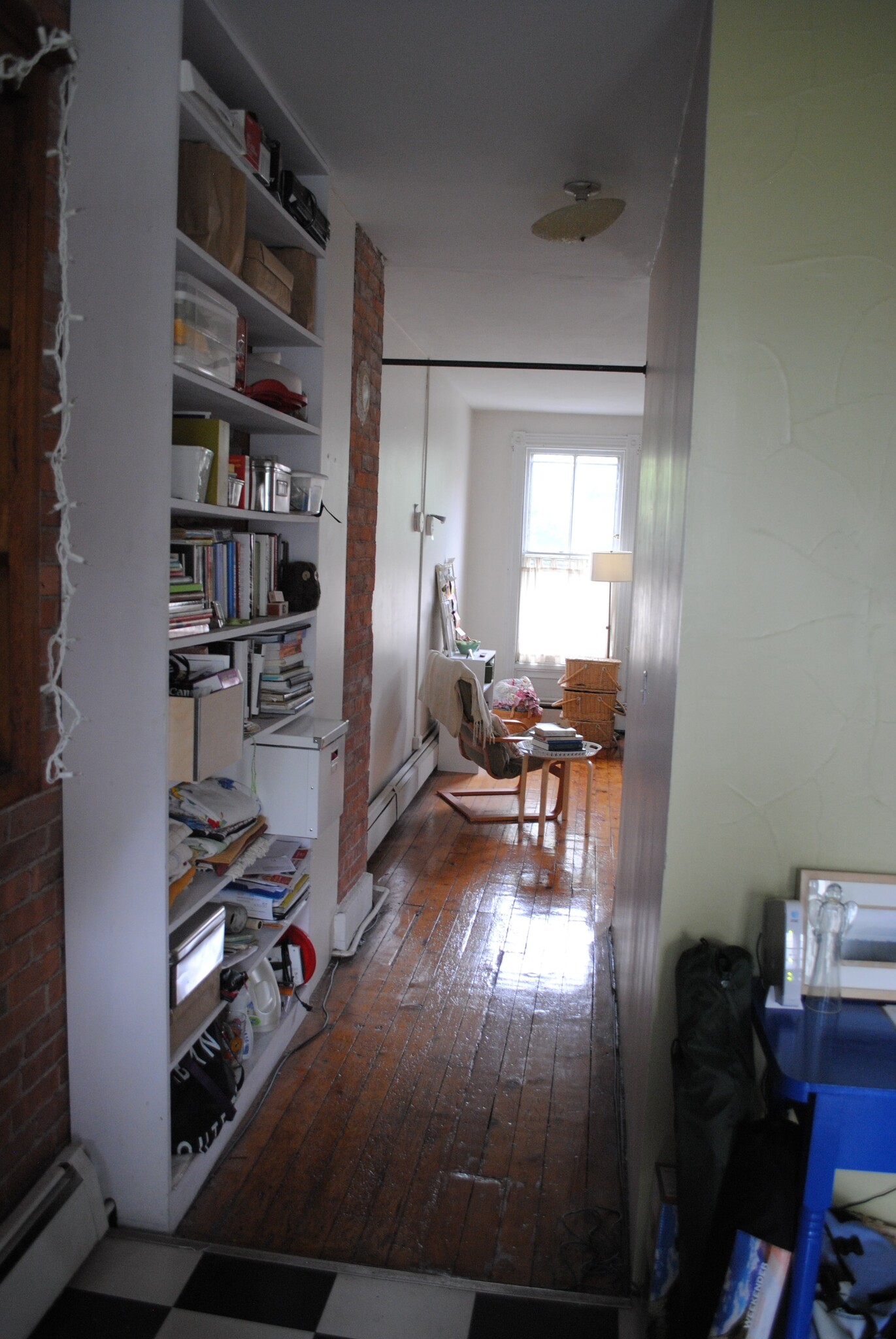Hallway looking from the kitchen to the living room - 204 Wooster St