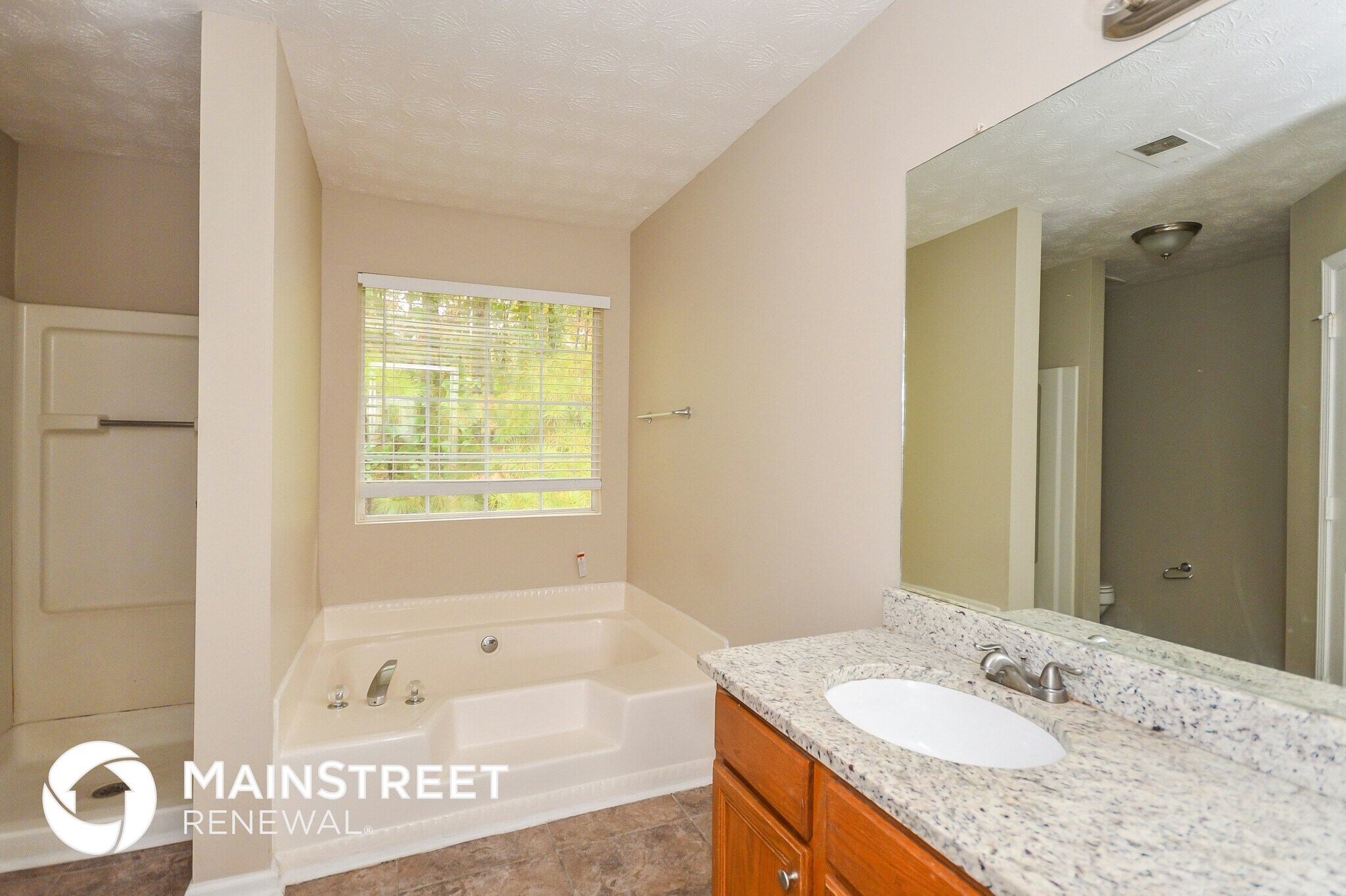 Building Photo - 6731 Hidden Lake Dr