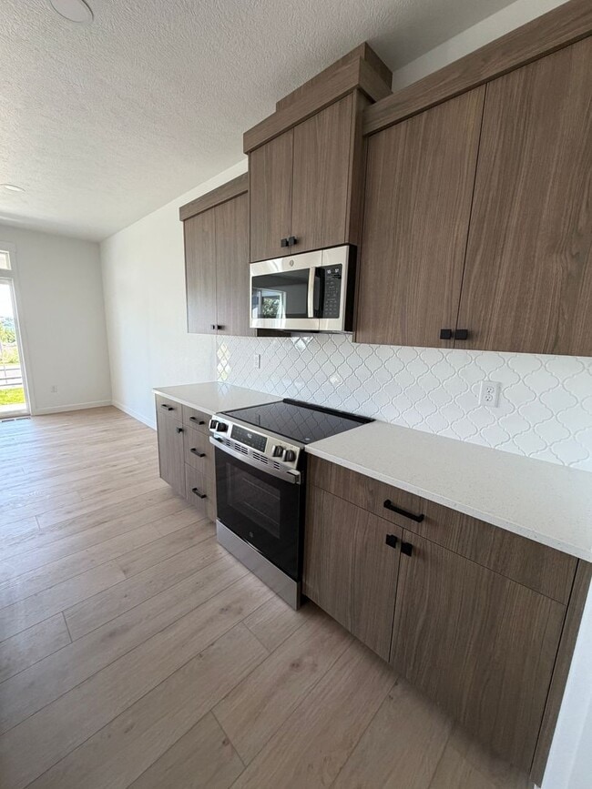 Building Photo - New Construction Condo at The Links on Moses Pointe!
