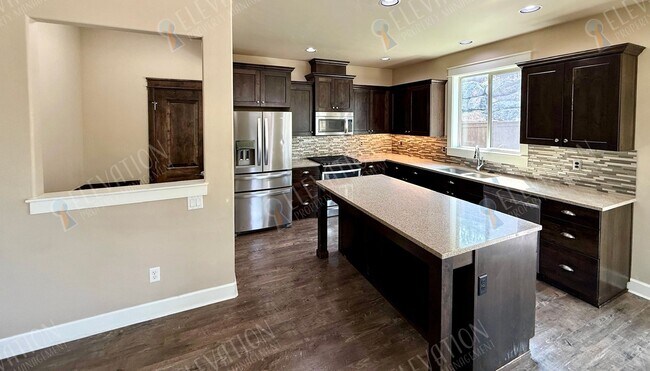 Building Photo - 63151 Black Powder Ln