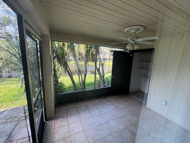 Building Photo - 3 BR / 2 BA Ground-Floor Condo | Screened ...
