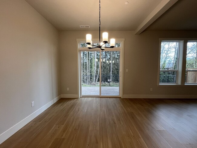 Building Photo - Modern 2025-Built 4 Bedroom Home with EV Charging, 5kW Solar, Open-Concept Living, Scenic Outdoor...