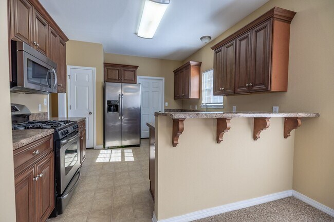 Building Photo - Now Available in Spanish Fort – Churchill Downs Community!