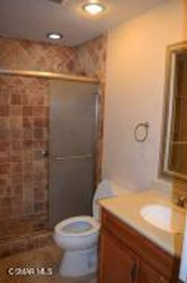 Building Photo - This is a lovely 2 bedroom, 1 1/2 bathroom...