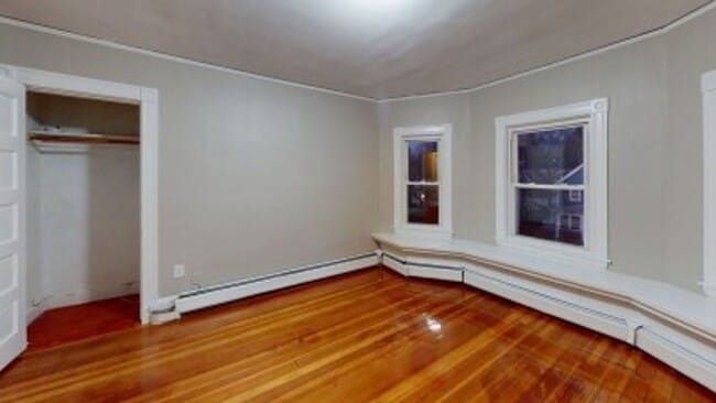 Building Photo - Renovated 6BR with In-Unit Laundry, 3 Parking Spaces & Commuter Rail Access