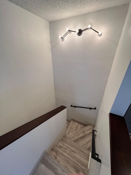 Stairs to Lower Level Bedroom and Bathroom - 236 S Curtis Ave