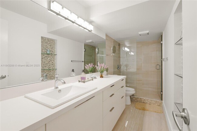 Building Photo - 10275 Collins Ave