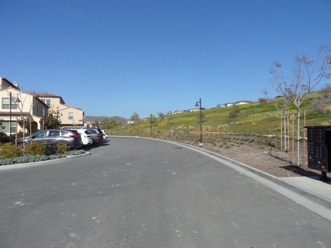 Building Photo - 4BR 3BA two-story condo with 2 Car Attached Garage