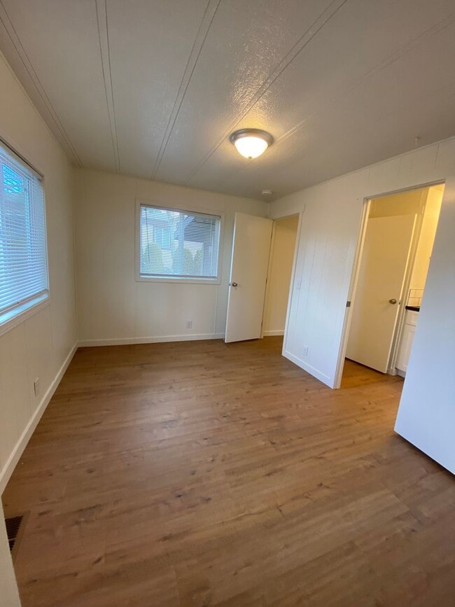 Building Photo - Beautifully just Remodeled-Spacious 3 bedrooms, 2 full baths mobile home with fenced yard. storag...