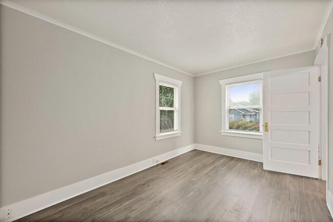 Building Photo - Charming Corner-Lot Tacoma Home with Huge ...