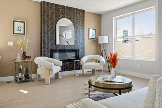 Building Photo - MOVE IN INCENTIVES!!  Bright & Spacious End-Unit Townhome with Garage, private yard area, and Pet...