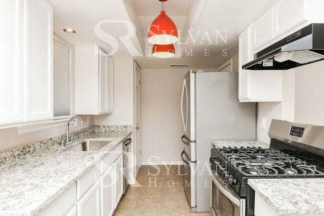 Building Photo - Turn the key. Enter. Smile. Repeat every day!