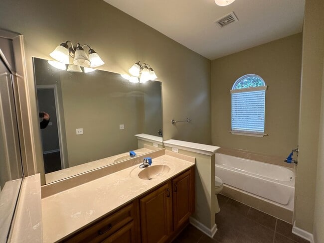 Building Photo - Updated 3 bd 2 bath with large fenced yard.  Pets are allowed!