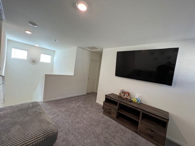 Building Photo - FULLY FURNISHED!!! beautiful 3 bedroom 2 and half bath home is located in the Symmetry Bay Cadenc...