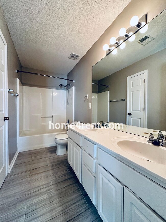 Building Photo - Gorgeous, Updated Home w/ Granite Counters and Wood Floors in Kitchen, Walkout Finished Basement!