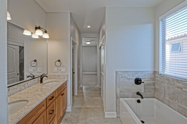 Building Photo - BUILT IN 2019: SPACIOUS & BRIGHT, DETACHED TOWNHOUSE W/ 2-CAR GARAGE & FENCED YARD IN GREAT RESID...