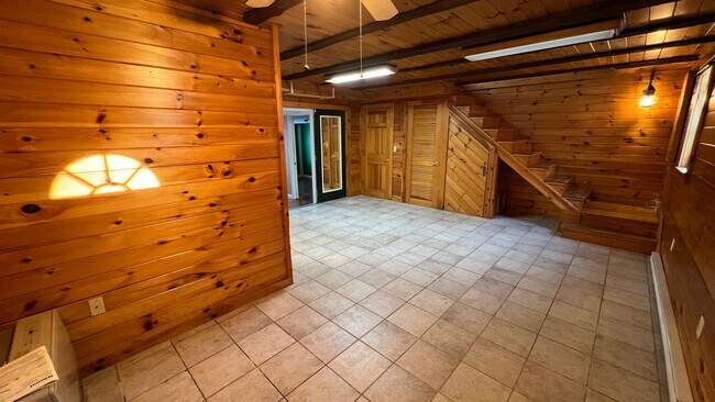 Building Photo - Rustic Single Family Home, Private Deck, Fenced-In Back Yard, Wood Flooring ...