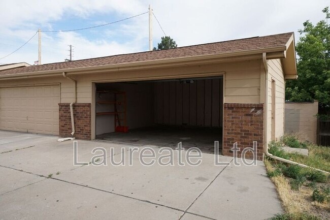 Building Photo - 6062 E 62nd Ave