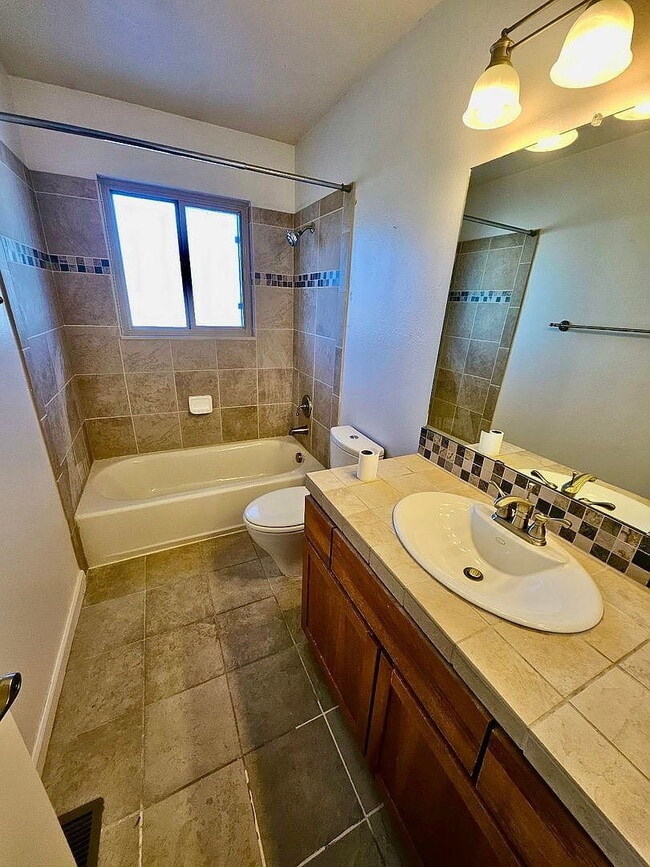 Building Photo - "Stunning 4-Bed, 3-Bath Family Retreat in Colorado Springs!"