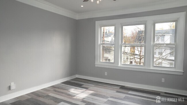 Building Photo - 65-65 Poe Ave