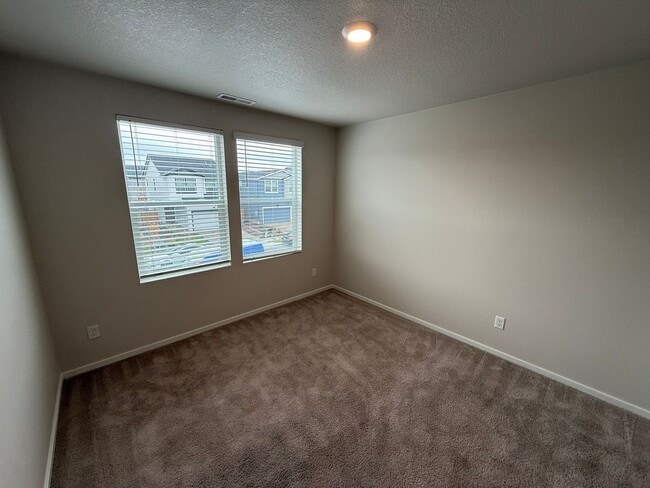 Building Photo - 4833 Thyme Ave NE