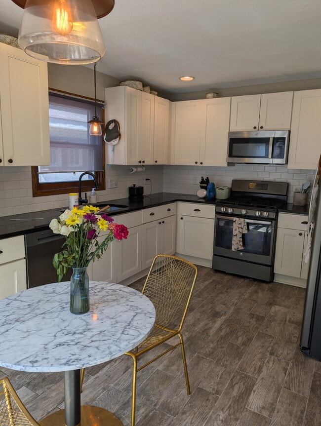 Building Photo - 3BR/2BA Northeast Minneapolis Home With Character, Privacy, and Room to Relax