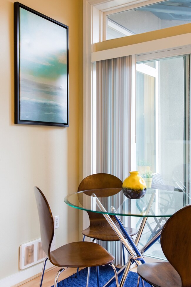 Dining area seats four, overlooking courtyard - 2415 2nd Ave