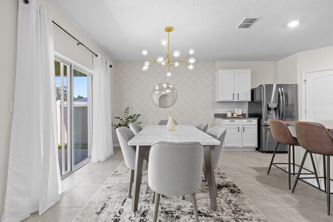 Building Photo - 4BR Under $2,300/mo | Tesla Charger | 15 Min to Lake Nona