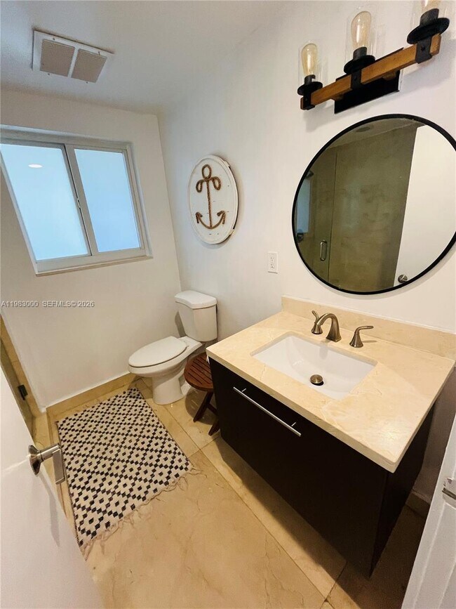 Building Photo - 10190 Collins Ave