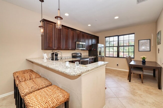 Building Photo - ? Stylish 2BR/2BA Townhouse in Resort-Style Community | Available July 2025 – April 2026 | 30-Nig...