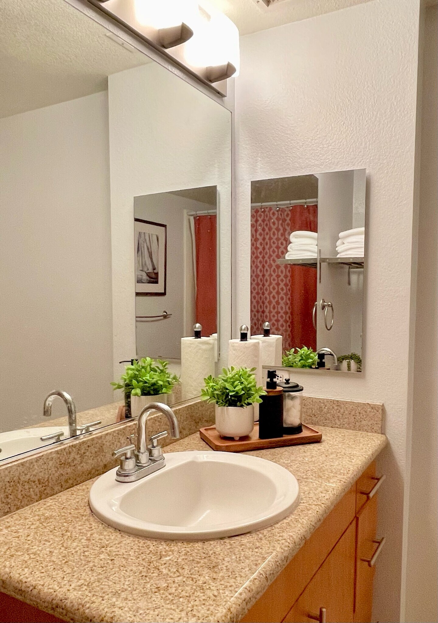 Granite sink area with ample lighting and storage. - 3687 4th Ave
