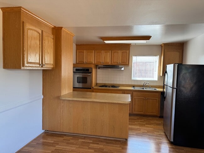Building Photo - Single level 4 bedroom, 2  bath home – mov...