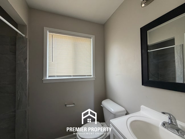 Building Photo - Spacious 4BR/2BA Home in Bartlett Cove | Brick Fireplace & Formal Dining
