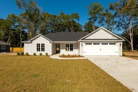 Building Photo - Charming 3-Bedroom Home with Modern Featur...