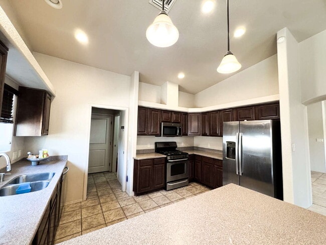 Building Photo - "Spacious 4-Bedroom, 2-Bathroom SOLAR Home in Mesa del Sol!"