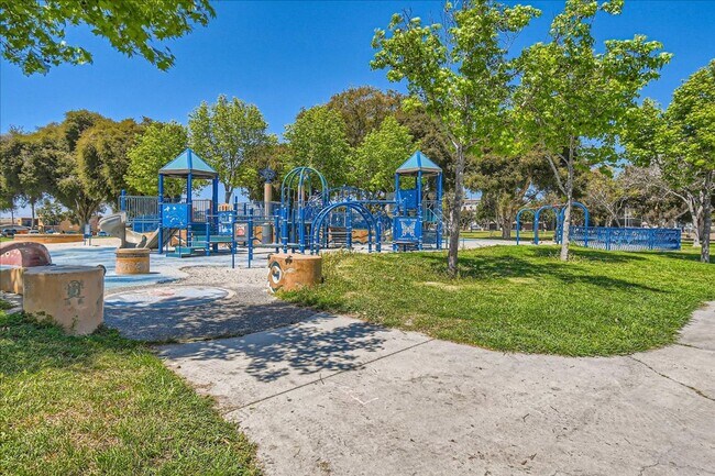 Building Photo - MOVE IN SPECIAL- Live in the Heart of Nort...