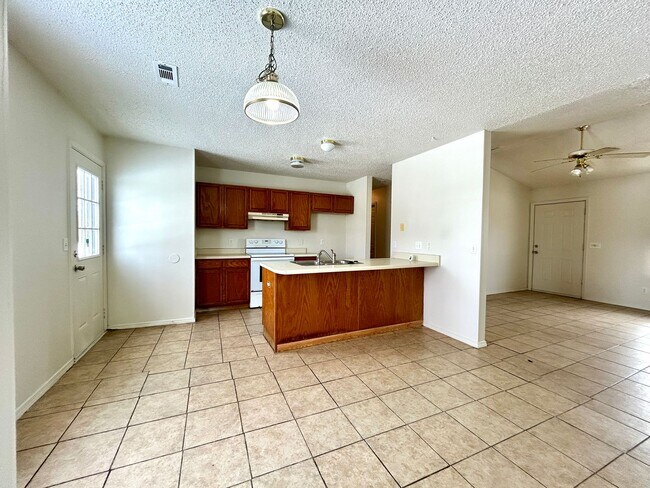 Building Photo - Elkins! 3 bed 2 bath with a huge fenced back yard