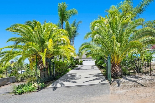 Building Photo - Beautiful Custom Built, Two-Story Home on Stunningly Landscaped Property with Gated Entrance!