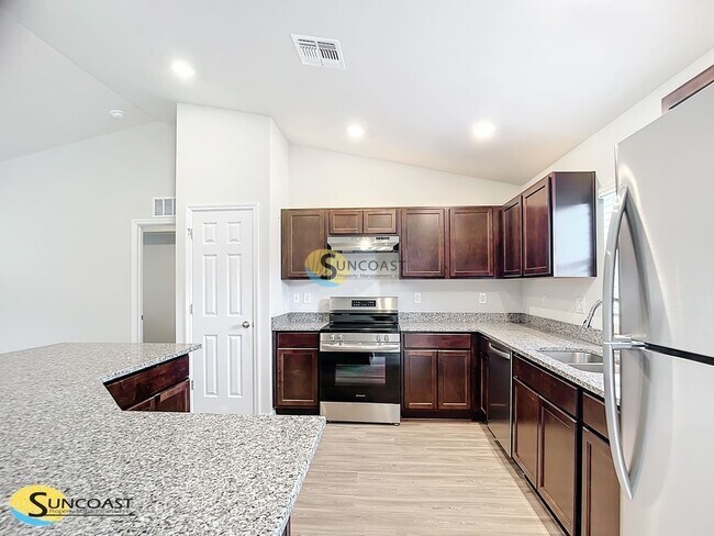 Building Photo - 7839 N Quibble Ave