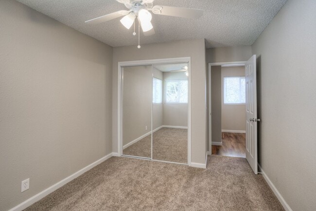 Building Photo - Greenwood Estates has an Excellent 2 Bedroom, 1.5 Bath Townhouse with a Backyard and Garage!