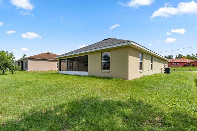 Building Photo - Newer 3BR Home on Nearly 1/4 Acre | Screened Lanai | Available Now!