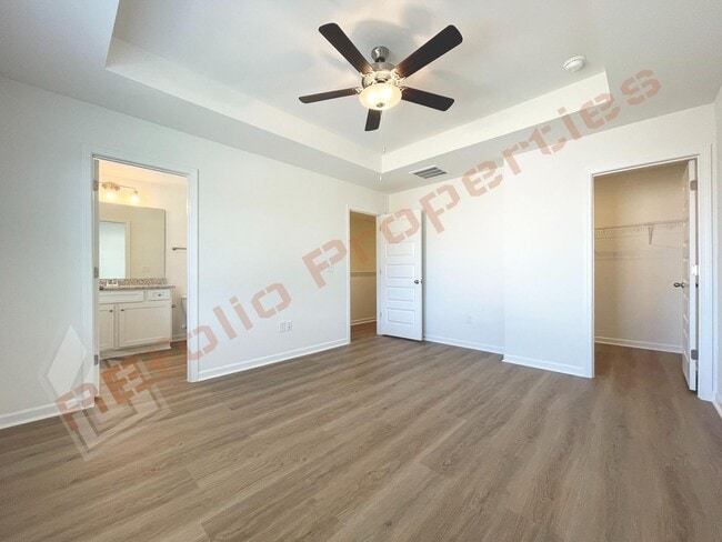 Building Photo - Move In by April 30 & Save $200/Month! Townhome Only $1,695! Regular $1,950 — Available NOW