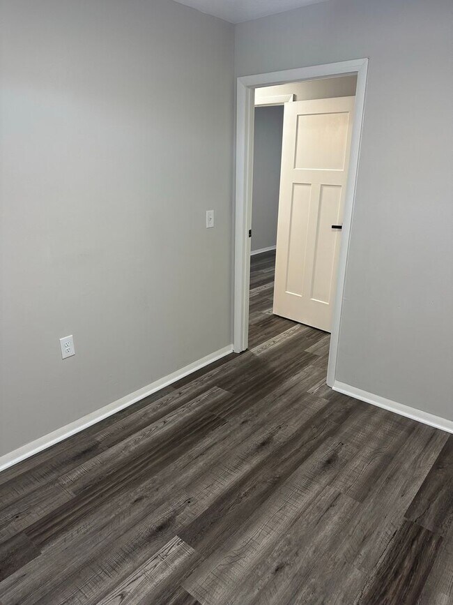 Building Photo - Oversized 3 Bedroom with laundry room!