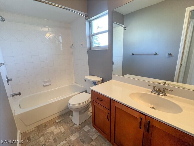 Building Photo - 9511 Cypress Dr N