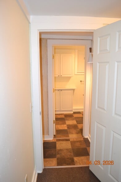 from bedroom, looking thru hall into bathroom - 222 W Case St