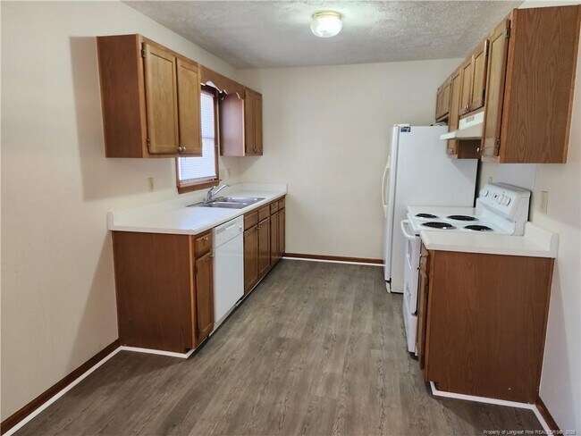 Building Photo - 6445 Rhemish Dr