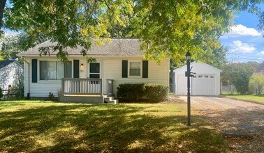 Building Photo - 2 bed, 1 bath ranch with partially finished basement & garage